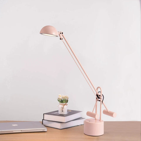 Halotech 29-Inch LED Desk Lamp With Counter-Balance Arm, Polished Steel, 8W LED, Adjustable Shade, on desk beside books and laptop