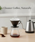Square Lyocell Pour Over Coffee Filters 50 Pack Disposable Cone Dripper Papers in use with coffee brewer and cup