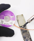 Desoldering Wick Set for PCB Repair Copper Desoldering Braid in use with soldering iron and circuit board, 2.0mm width