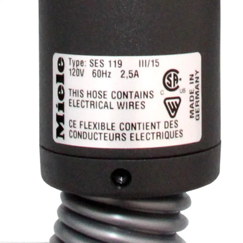 Close-up of label on Electric Hose SES119 For S5 Series Vacuum Cleaners showing specifications and safety warnings.