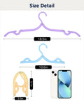 Ultra Compact Foldable Travel Hangers Set for Cruise Ship and Air Travel size comparison to smartphone