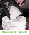 Hand pouring All Liquids Spill Powder That Eats Messes Fast, Ultra Absorbent Spill Cleanup For Vomit Urine Oil And All Liquids into bucket