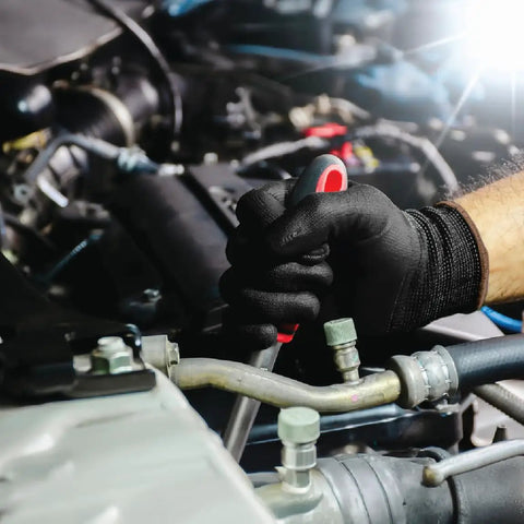 Mechanic wearing P Grip Ultra Thin Polyurethane Palm Coated Seamless Work Glove For Mechanic Construction Industrial Tasks 13 Gauge Polyester Shell Lightweight Breathable Fit Medium Black Pack Of 12 while working on engine