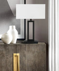 White Indoor Table Lamp With Dimmable Brightness And On Off Switch on nightstand with white shade and black base