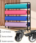 Heavy Duty Fabric Roll Storage Rack With Adjustable Textile Display Shelves And Slick Rolling Platform holding colorful fabric rolls.