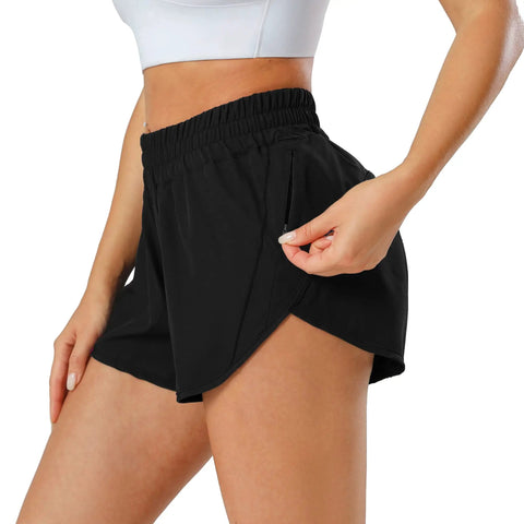 Woman modeling Women's Quick Dry Go-To Track And Running Athletic Shorts For Training With Elastic Waistband Zip Pockets Built In Liner