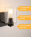 Set Of Two Matte Black Wall Sconces With Clear Glass Shade, Industrial Farmhouse Vanity Lighting Fixtures For Bathroom Mirror And Hallway, Metal Sconce Wall Lighting, Bulbs Not Included showing clear glass shade and E26 base