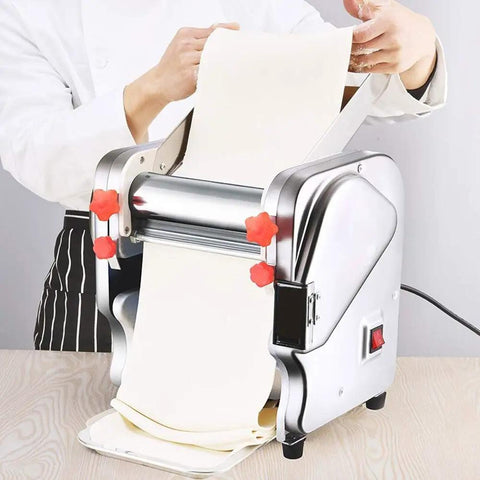 Compact Automatic Electric Pasta Maker For Fresh Homemade Noodles stainless steel with red knobs rolling dough.