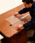 Man using Big 49 Inch Acrylic Heat Bending Machine 1500W to position a clear acrylic sheet for thermoforming.