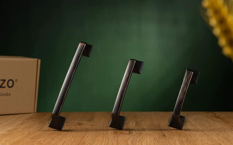 Oil Rubbed Bronze 5 Inch Cabinet Pulls Pack Of 10 Solid Metal Contemporary Big Square Arch Handles on wooden surface