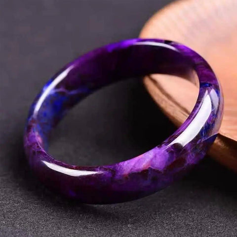 Raw Mineral Emperor Purple Perilla Stone Bracelet With Shudulai Old Material on textured surface