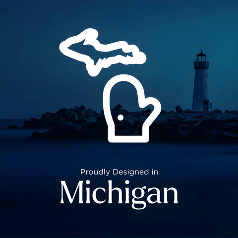 Silhouette of Michigan state with lighthouse background, text 'Proudly Designed in Michigan'