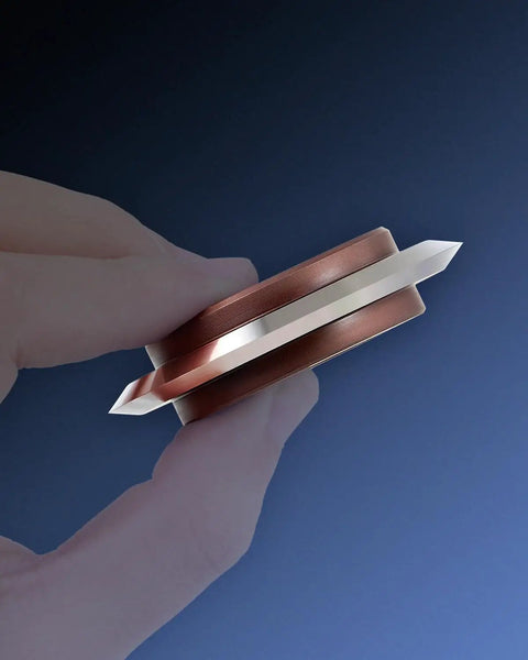 Side view of Cable Stripper Replacement Blade For 0.06 In To 1 In Copper Wires, fits most copper wire strippers, held between fingers.