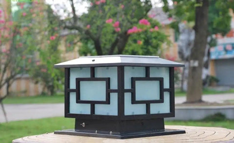 11.8 Inch Square Solar Led Post Cap Lights No Wiring Needed Outdoor Pillar Lights Black Finish in garden setting