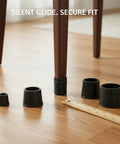 Straight Up Legit Round Chair Leg Protectors With Black PU Leather Slip On Floor Guards For Hardwood Surfaces Quiet Glide Pads on wood floor.
