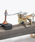 Strong Hand Tools Deluxe Magnetic Grasshopper welding finger with copper spindle, magnetic V-pad base on pipe (side view)