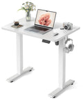 32 Inch Electric Standing Desk With Adjustable Height From Sitting To Standing, Sit Stand Workstation For Home Office And Computer Setup, Three Memory Height Settings For Quick Repositioning, Compact White Desk For Small Spaces.
