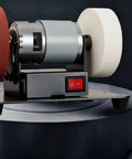 Badass Compact Bench Grinder With Dual Wheel Grit Setup Sleek Steel Body Heavy Duty Motor Housing Quick Swap Stones Shop Ready No Drama Finish For Real Jobs, showing dual wheels and motor.