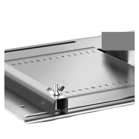 Top Shelf Benchtop Table Saw Featuring Rock Solid Stainless Steel Top And Hefty Copper Motor That Cuts Hardwood Like Butter For Smooth Zero To Forty Five Degree Precision Bevel Cuts measuring scale for accurate cuts