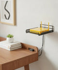 Heavy Duty Black Metal Mesh Wall Mount Bracket For Modems And Network Gear holding yellow router on wall