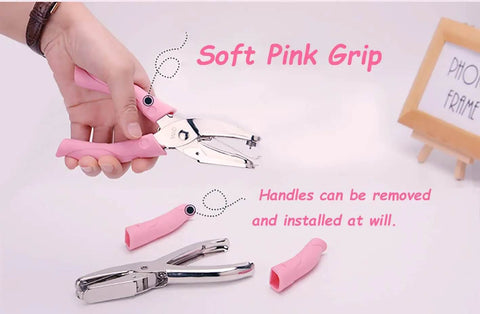 Mini One Quarter Inch Circle Hole Punch With Pink Soft Grip for DIY craft tags, clothing tickets, scrapbooking tool puncher shown with removable handle.