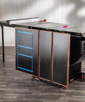 Folding Table Saw Outfeed Kit with adjustable height legs and foldable steel frame attached to a cabinet saw in a workshop.
