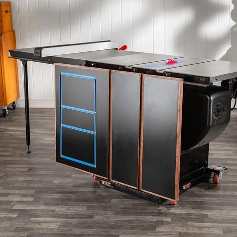 Folding Table Saw Outfeed Kit with adjustable height legs and foldable steel frame attached to a cabinet saw in a workshop.