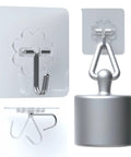 Close-up of 24 Pack Heavy Duty Self Adhesive Hooks Transparent Reusable Waterproof Wall Hangers For Kitchen Towels Curtains Bathroom Coats And Shower Doors No Damage Easy To Install Removable Without Residue supporting weight