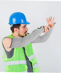 Heavy Duty Cut Resistant Arm Sleeves With Thumb Hole And No Sweat Breathable Design For Mechanics And Craftsmen wearing protective gear.