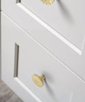 Twenty Pack Dope Gold Cabinet Knobs Hammered Solid Brass Round Drawer Pulls and Handles for Kitchen Cabinets installed on white drawers.