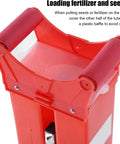 Close-up of Red Double Barrel Garden Seeder With Interchangeable Seed Plates Portable Manual Planter for Corn and Veggies