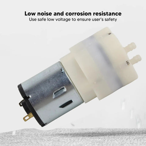 Built Legit Smooth Operator Mini Vacuum Pump Motor DC 12V Micro Air Suction Unit Low Noise Industrial Grade Engine on a grey background.