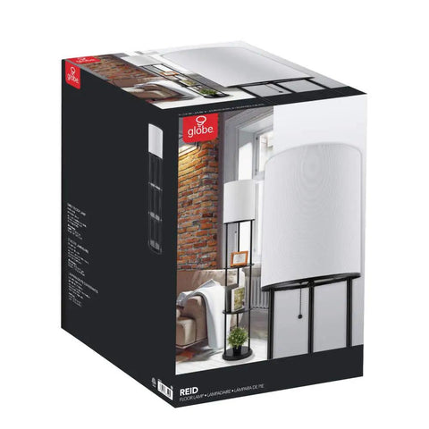 Box packaging of Versailles Floor Lamp With Built-In Shelves, 57.5 Inch Matte Black, White Linen Shade, displayed in living room.