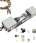 Tiny Powerhouse Mini Lathe For DIY Metal Wood Stone Projects showing all metal build, cutting tools and accessories for precise crafting.