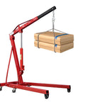 Heavy Duty Two Ton Folding Engine Hoist With Six Swivel Caster Wheels And Precision Leveler lifting boxed materials.