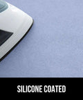 Close-up of iron on Magnetic Ironing Blanket Travel Size 28x24 With Silicone Coating Scorch Resistant Up To 400 Degrees, blue surface