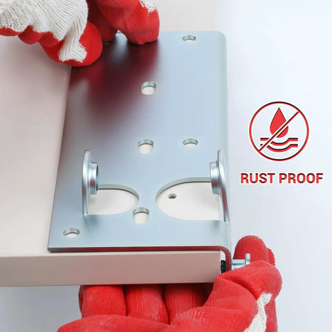 Person holding beefed up heavy duty replacement garage door bottom roller brackets with seven sixteenth inch diameter roller stem.