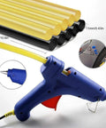 Fast Heating 100W Hot Glue Gun With 10 High Adhesion Glue Sticks For Car Dent Repair And DIY Crafts Great For Home Improvement And Quick Daily Fixes Anti Drip Design And Easy On Off Switch shown with glue sticks