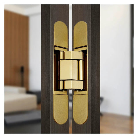 Close-up of Premium 3D Adjustable Hidden Cross Hinge for Wood Doors and Gates Self-Closing Silent Operation in gold finish.
