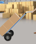 Heavy Duty Aluminum Hand Truck 500lbs Capacity Steel Handle Dolly Cart horizontal loop design with large brown box in use.