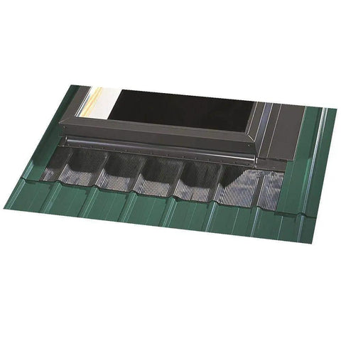 Tough As Nails Metal Roof Skylight Flashing Kit With Heavy Duty Adhesive Underlayment And Interlocking Pleated Sill Apron for deck mount. View of installed skylight flashing on green metal roof.