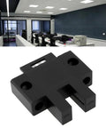 SX670P Slot Type Photoelectric Sensor 25.5 by 28.5 mm, 5mm U-shaped slot, black plastic in an office setting