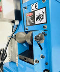 Close-up of Beast Mode Model 60 Copper Wire Stripping Machine With 2HP 120V Motor, showing blue industrial steel frame detail.