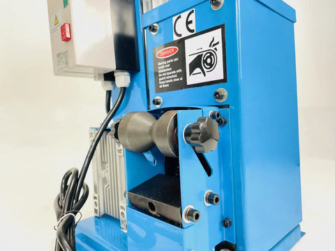 Close-up of Beast Mode Model 60 Copper Wire Stripping Machine With 2HP 120V Motor, showing blue industrial steel frame detail.