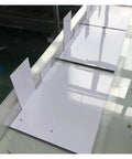 No-Fuss Portable Heat Bending Machine For Acrylic And PVC Sheets 60Cm with white acrylic sheets laid out for bending.