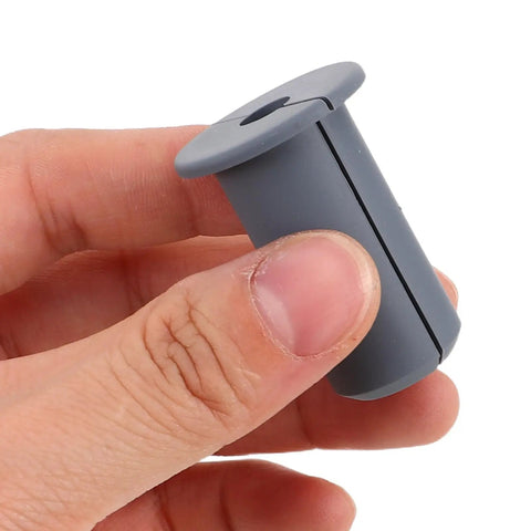 Slick Silicone Cable Grommet Kit That Keeps Your Home And Office Totally Neat With Six Heat Resistant Wall Bushings For Easy Wire Protection And Fast Setup gray silicone cable grommet in hand