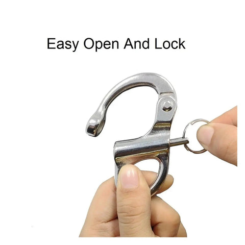 Rock Solid 316 Stainless Steel Snap Shackle Quick Release Swivel Bale Hook with easy open mechanism in hand