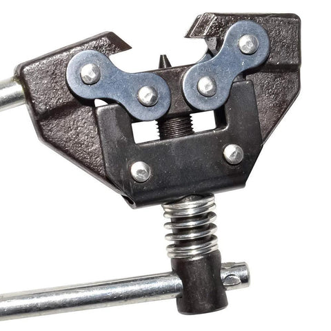 Roller chain breaker tool, black metal with spring clamp, for motorcycle/bicycle chains (#25–60).