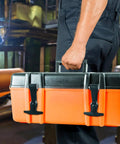 Person holding toolbox with Stainless Steel Rubber T Handle Draw Latches 2 Pack For Tool Boxes Cabinets And Equipment Heavy Duty Grip And Easy Install Versatile Latch Hardware For Secure Closure