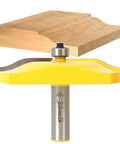 Heavy Hitting Ogee Raised Panel Raiser Bit For Table Router With Half Inch Shank and Knifelike Carbide Edge, ideal for smooth cuts.